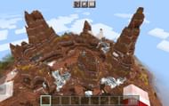 Huge Badland mountains with a sprinkle of snow (Image via Minecraft)